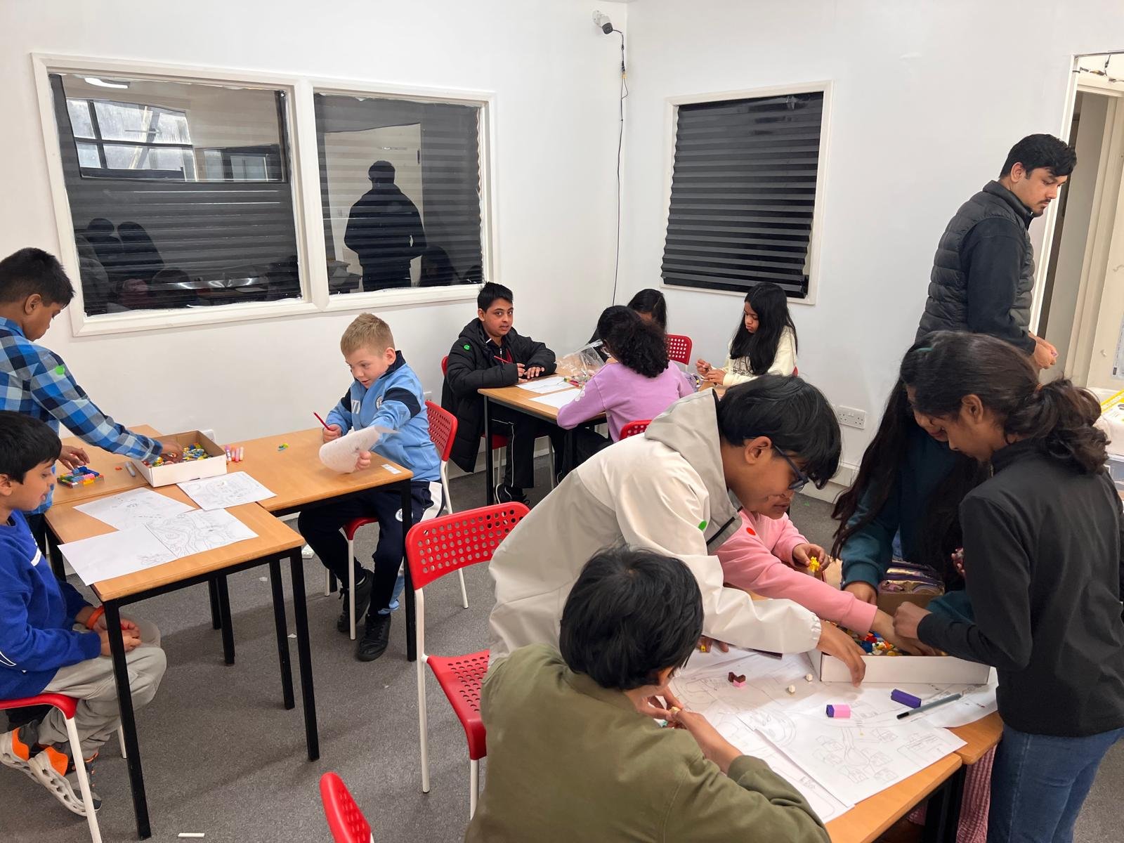 Students taking part in group STEM activities at ARK Education Centre