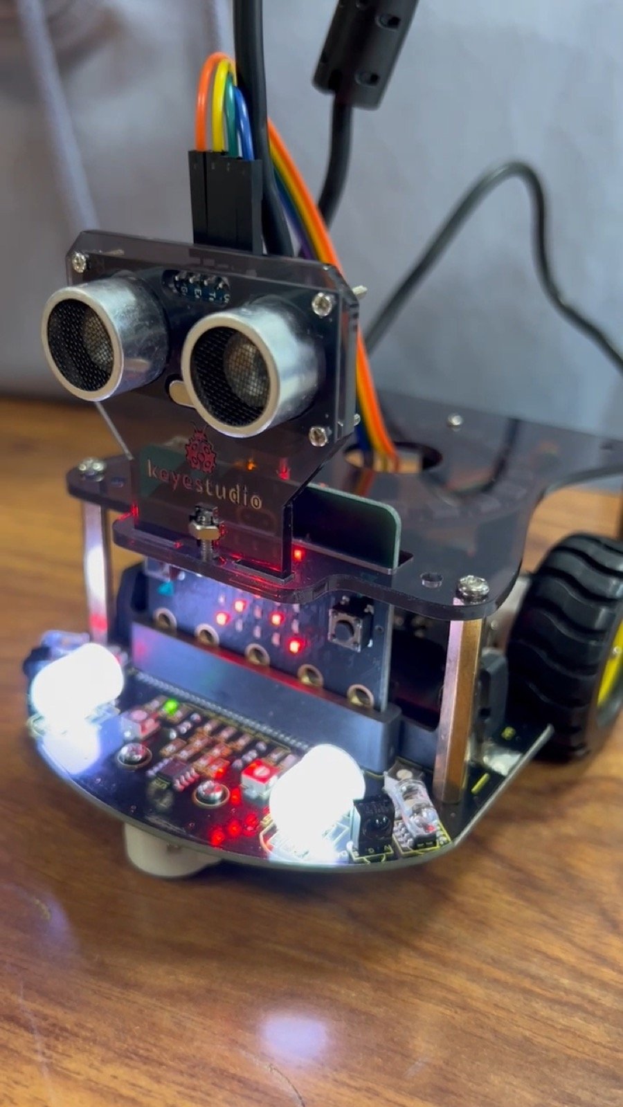 Close-up of a robot with lights and sensors